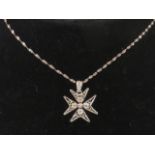 A silver filigree Maltese Cross pendant,