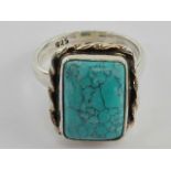 A handmade turquoise ring, rope twist se