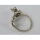 A silver ring in the form of a cat, stam