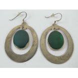 A pair of large green stone and silver e