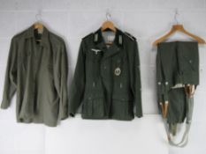 Reproduction uniforms; German combat jacket with insignia,