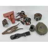 A quantity of assorted WWII German militaria inc; cutaway Bakelite bomb fuse.