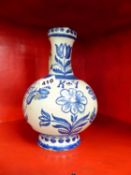 AN 18th/19th C. CENTRAL EUROPEAN BLUE AND WHITE TIN GLAZED EWER PAINTED WITH TULIPS AND OTHER
