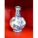 AN 18th/19th C. CENTRAL EUROPEAN BLUE AND WHITE TIN GLAZED EWER PAINTED WITH TULIPS AND OTHER