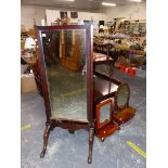 A ANTIQUE MAHOGANY FRAMED CHEVAL MIRROR AND TWO DRESSING TABLE MIRRORS.