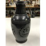 A JAPANESE RETICULATED BALUSTER VASE WITH GILT INSCRIBED CHARACTER.