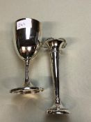 A HALLMARKED SILVER GOBLET TOGETHER WITH A LOADED FLARED TRUMPET VASE.