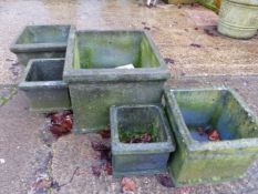 FIVE BLACK SQUARE PLANTERS.