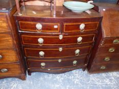 AN EARLY 19th C. MAHOGANY AND INLAID BOW FRONT CHEST OF TWO SHORT AND THREE LONG DRAWERS.