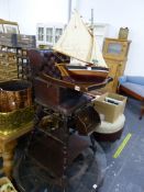 A CHILD'S METAMORPHIC HIGH CHAIR, TOGETHER WITH A SMALL MODEL BOAT.