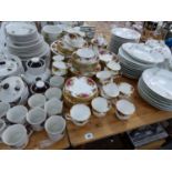 A ROYAL ALBERT OLD COUNTRY ROSE TEA AND DINNER SERVICE, TOGETHER WITH A DOULTON WEST WOOD PATTERN