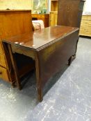 AN ANTIQUE MAHOGANY DROP LEAF DINING TABLE OF SHAPED OUTLINE.