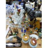 A COLLECTION OF FIGURINES TO INCLUDE LLADRO NUNS, KAISER FIGURINE, A RUSSIAN PAINTED SOLDIER, GOEBEL