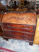 A GOERGE III MAHOGANY FALL FRONT BUREAU.