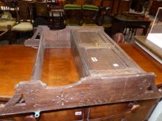 A SMALL OAK WALL CABINET.