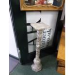 A CARVED ALABASTER PEDESTAL 92 CM HIGH