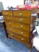 A 19th C. OAK AND CROSS BANDED TALL CHEST OF TWO SHORT AND FOUR LONG DRAWERS.