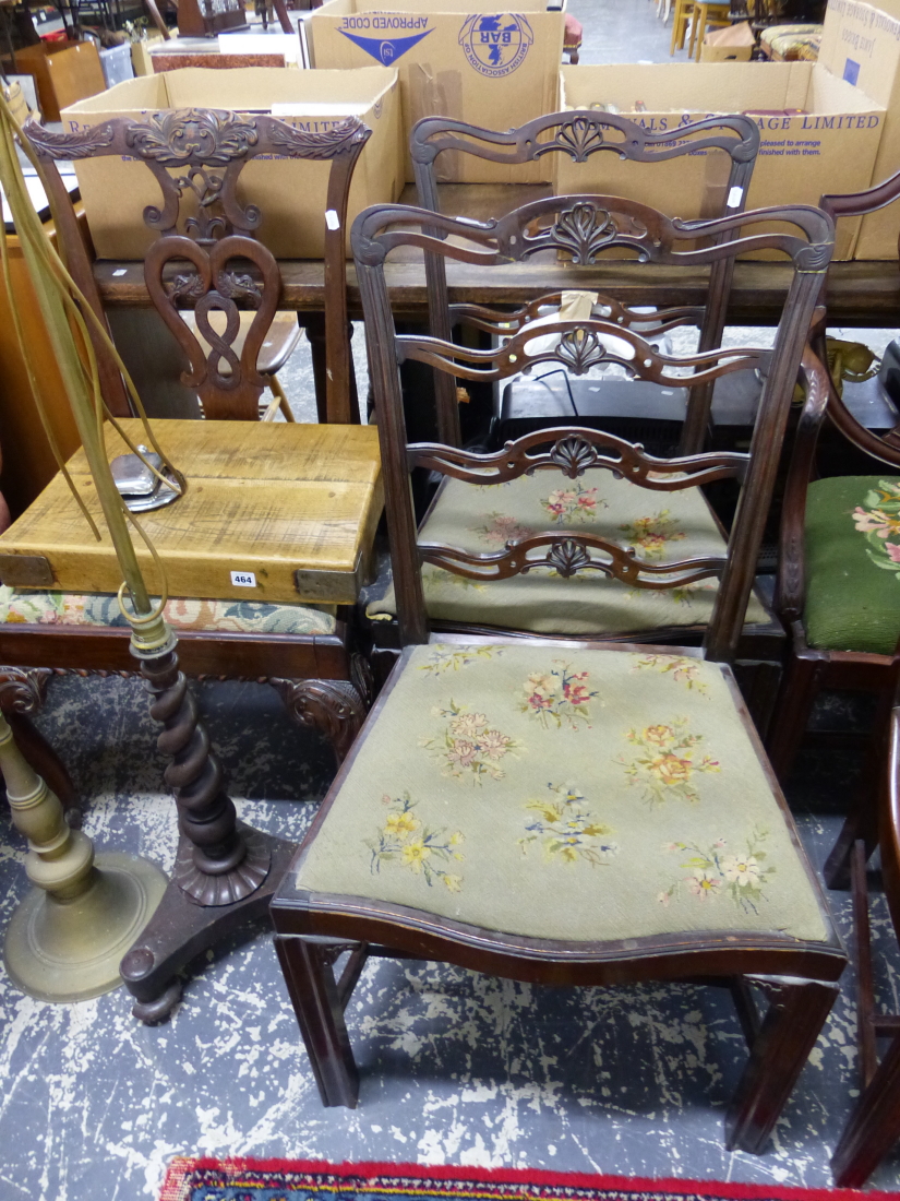 A PAIR OF GEORGIAN STYLE LADDER BACK DINING CHAIRS AND A FURTHER CHAIR ON CARVED CABRIOLE LEGS