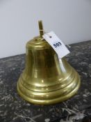 A VINTAGE BRASS BELL WITH CLAPPER.