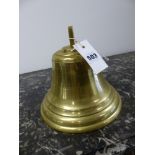 A VINTAGE BRASS BELL WITH CLAPPER.