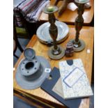 A PAIR OF BRASS CANDLESTICKS, A PEWTER CAPSTAN INKWELL, A WARMING PLATE , NEW FOREST MAP ETC.