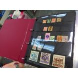 A STOCK BOOK ALBUM OF AUSTRALIA STAMPS AND COVERS.