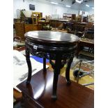 AN ORIENTAL HARD WOOD URN STAND, A VICTORIAN DRESSING STOOL AND TWO FOOT STOOLS.