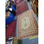 A TURKISH RUG 174 X 120 TOGETHER WITH TWO OTHERS OF BOKHARA DESIGN