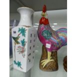 AN ORIENTAL ROOSTER FIGURE AND A VASE DECORATED WITH ORIENTAL CHARACTERS.