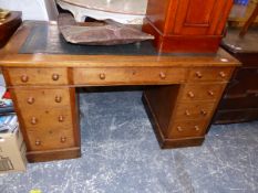 A VICTORIAN MAHOGANY TWIN PEDESTAL DESK.