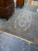 A PERSIAN CARPET OF CLASSIC DESIGN, 284 X 188cms.