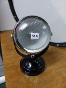 A VINTAGE STYLE HEAD LAMP TABLE LIGHT.