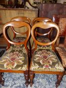 A SET OF FOUR VICTORIAN BALLOON BACK CHAIRS.