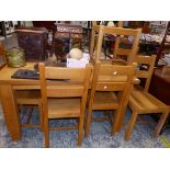 A MODERN OAK DINING TABLE AND SIX SIDE CHAIRS.