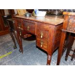 A GEORGIAN MAHOGANY SMALL DRESSING TABLE ON TURNED LEGS.