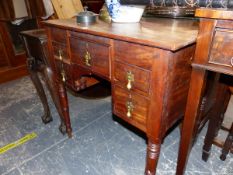 A GEORGIAN MAHOGANY SMALL DRESSING TABLE ON TURNED LEGS.