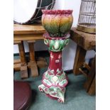 A VICTORIAN JARDINIERE STAND AND ASSOCIATED PLANTER.