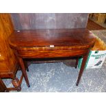 A LATE GEORGIAN MAHOGANY FOLD OVER TEA TABLE.