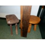 A RUSTIC LOW STOOL AND ONE OTHER