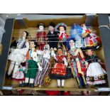 A DISPLAY CASE CONTAINING COSTUME DOLLS, AND TWO FURTHER BOXES OF SIMILAR DOLLS.
