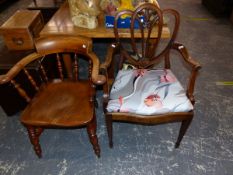 AN ANTIQUE CAPTAINS ARM CHAIR AND AN EDWARDIAN ARM CHAIR.