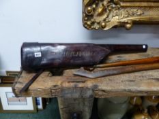 A LEATHER LEG O MUTTON GUN CASE.