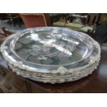 SIX LARGE ARMORIAL ENGRAVED SILVER PLATED PLATTERS.