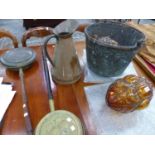 A LARGE BRASS BUCKET, COPPER EWER, A PAIR OF ORANGE GLASS LIGHT SHADES AND TWO WARMING PANS.