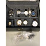 A STACKERS FITTED WATCH CASE FOR EIGHT WATCHES, AND ELEVEN VARIOUS WRIST WATCHES TO INCLUDE TIMEX,