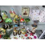 A COLLECTION OF BEATRIX POTTER FIGURES AND CERAMICS TO INCLUDE , DOULTON , BORDER FINE ARTS AND