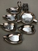 A SIGNED CONTINENTAL SILVER SWAN FORM ASHTRAY WITH SUITE OF FOUR FURTHER CONFORMING ASHTRAYS,
