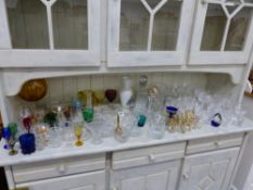 A QUANTITY OF VARIOUS COLOURED AND CUT GLASS WARES.