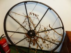 A LARGE VINTAGE IRON WHEEL 132CM DIA.