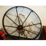 A LARGE VINTAGE IRON WHEEL 132CM DIA.